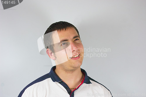 Image of confused young handsome man