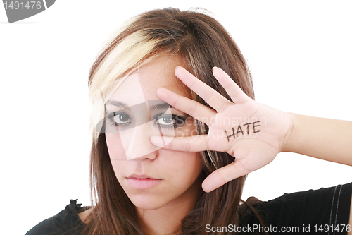 Image of Close up shot of a angry teenager, isolated on white background 