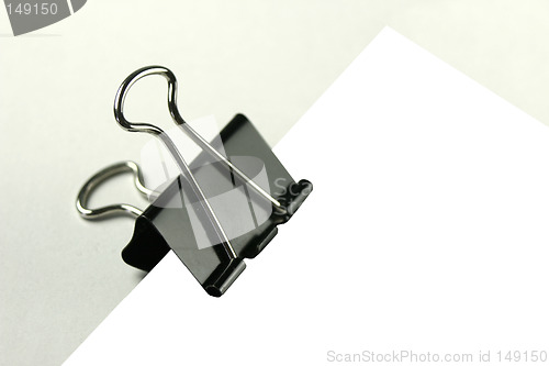 Image of notepaper in a clip