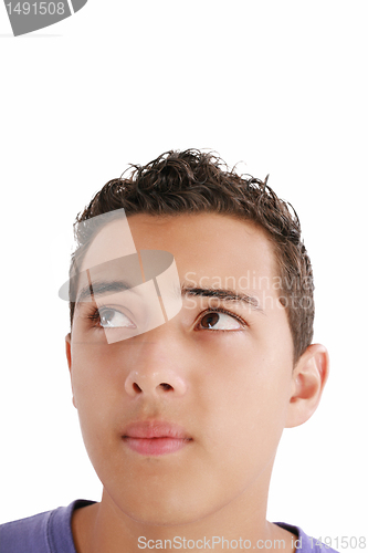 Image of Young man looking up into open space. Isolated over white backgr