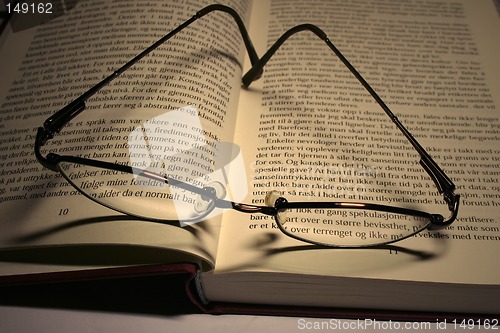 Image of book and glases