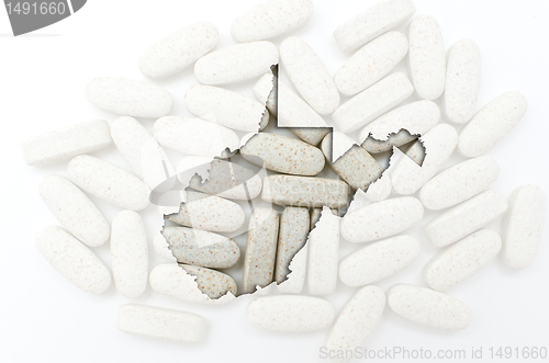 Image of Outline map of west virginia with transparent pills in the backg