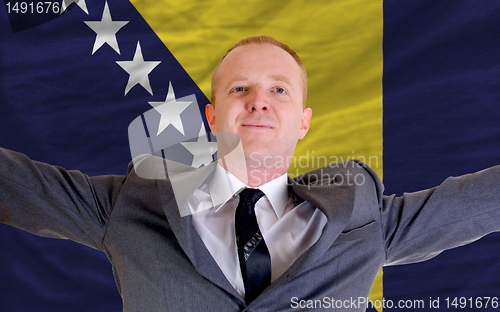 Image of happy businessman because of profitable investment in bosnia her