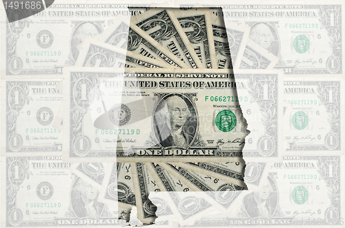 Image of Outline map of Alabama with transparent american dollar banknote