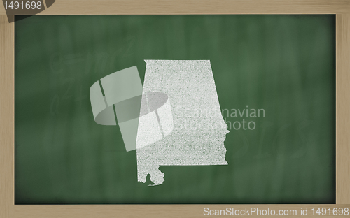 Image of outline map of alabama on blackboard 