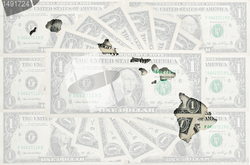 Image of Outline map of Hawai with transparent american dollar banknotes 