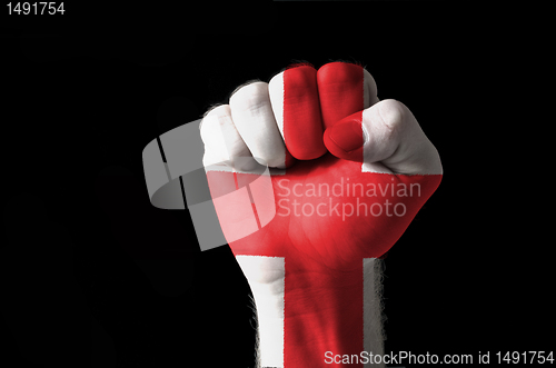 Image of Fist painted in colors of england flag