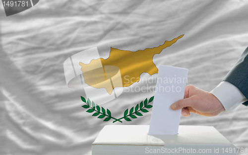 Image of man voting on elections in cyprus