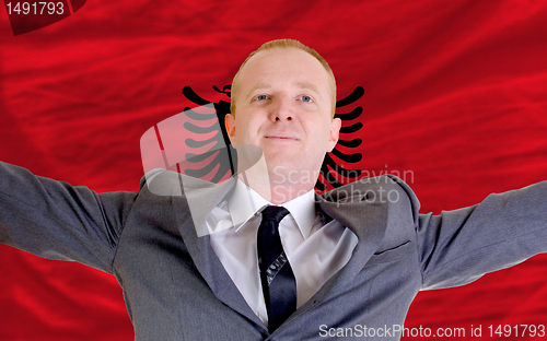 Image of happy businessman because of profitable investment in albania