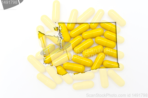 Image of Outline map of washington with transparent pills in the backgrou