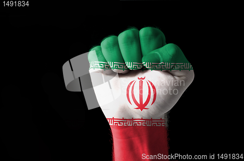 Image of Fist painted in colors of iran flag