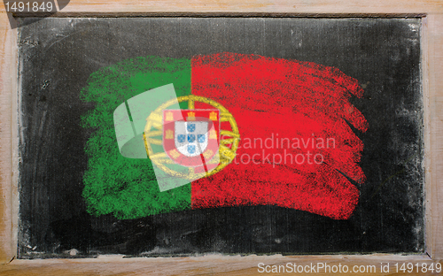 Image of flag of Portugal on blackboard painted with chalk  