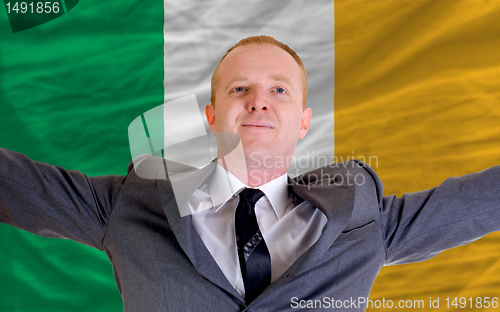 Image of happy businessman because of profitable investment in ireland st