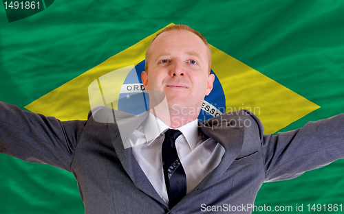 Image of happy businessman because of profitable investment in brazil sta