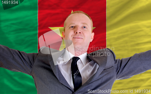 Image of happy businessman because of profitable investment in cameroon s