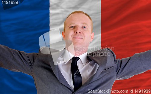 Image of happy businessman because of profitable investment in france sta