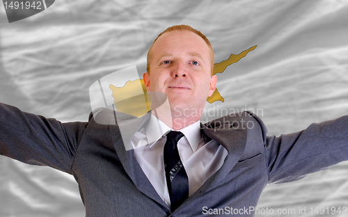Image of happy businessman because of profitable investment in cyprus sta
