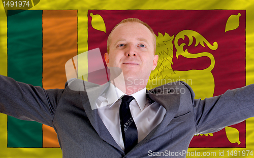 Image of happy businessman because of profitable investment in srilanka s