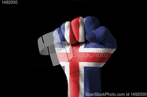 Image of Fist painted in colors of iceland flag