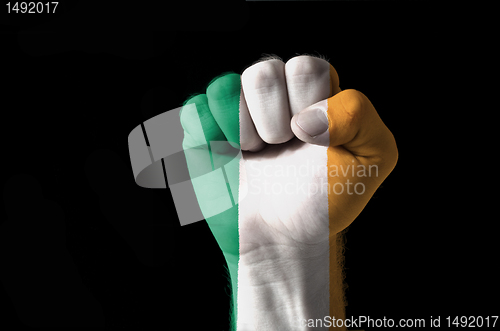 Image of Fist painted in colors of ireland flag