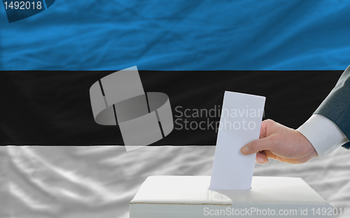 Image of man voting on elections in estonia