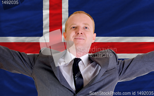 Image of happy businessman because of profitable investment in iceland st