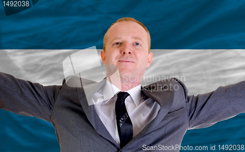Image of happy businessman because of profitable investment in el salvado