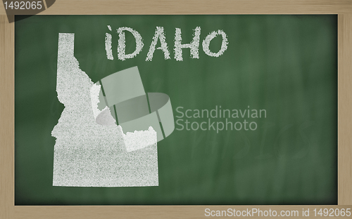 Image of outline map of idaho on blackboard 