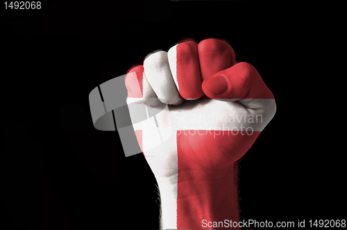 Image of Fist painted in colors of denmark flag