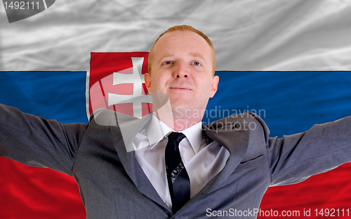 Image of happy businessman because of profitable investment in slovakia s