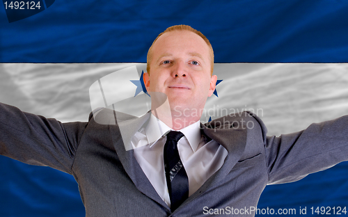 Image of happy businessman because of profitable investment in honduras s