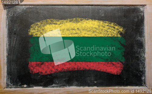 Image of flag of lithuania on blackboard painted with chalk  