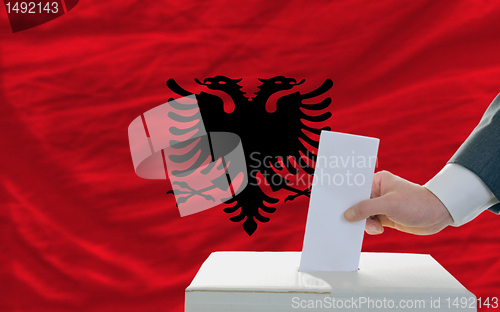 Image of man voting on elections in albania