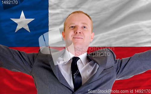 Image of happy businessman because of profitable investment in chile stan