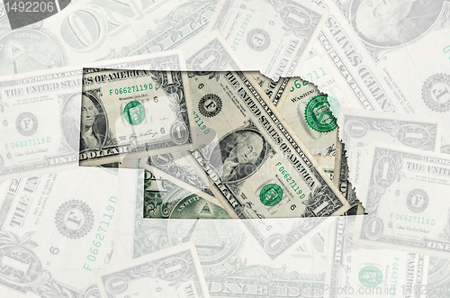 Image of Outline map of nebraska with transparent american dollar banknot