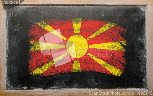 Image of flag of macedonia on blackboard painted with chalk  