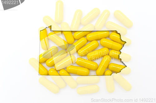 Image of Outline map of pennsylvania with transparent pills in the backgr