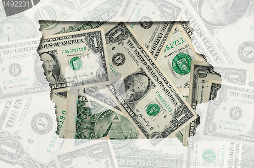 Image of Outline map of Iowa with transparent american dollar banknotes i