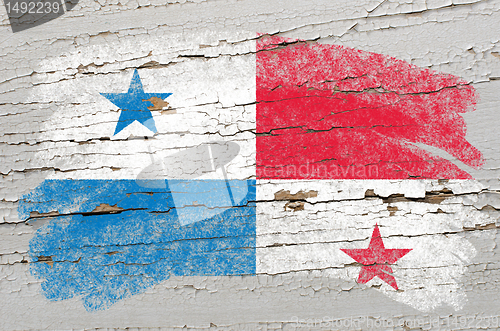 Image of flag of panama on grunge wooden texture painted with chalk  