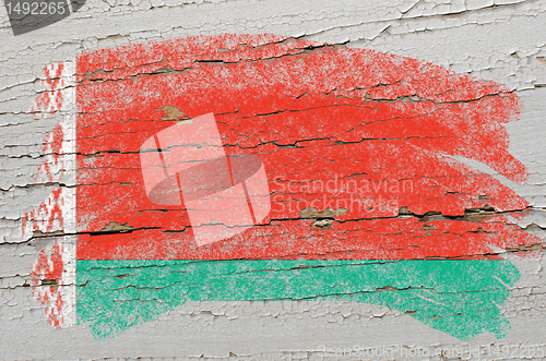 Image of flag of belarus on grunge wooden texture painted with chalk  