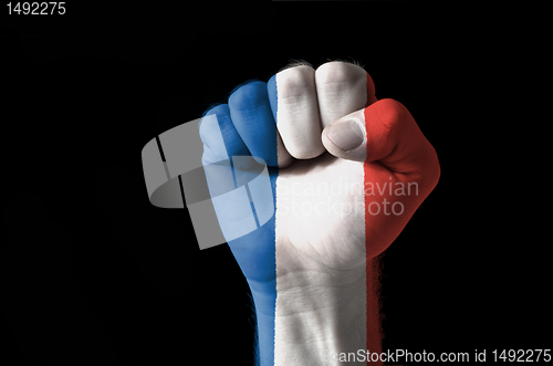 Image of Fist painted in colors of france flag