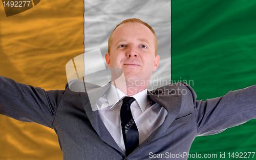 Image of happy businessman because of profitable investment in cote'd ivo