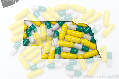 Image of Outline map of nebraska with transparent pills in the background