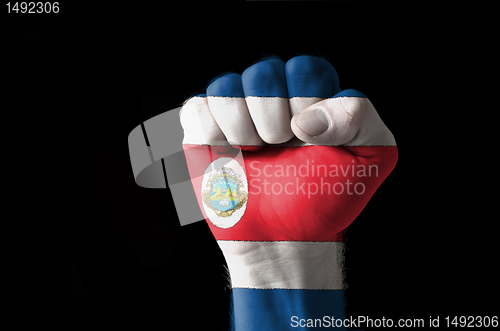 Image of Fist painted in colors of costa rica flag