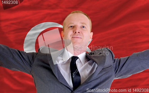 Image of happy businessman because of profitable investment in turkey sta