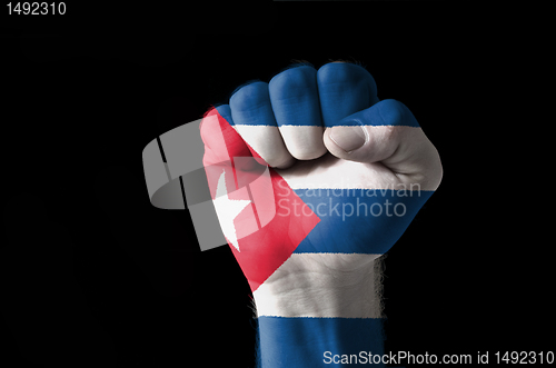 Image of Fist painted in colors of cuba flag