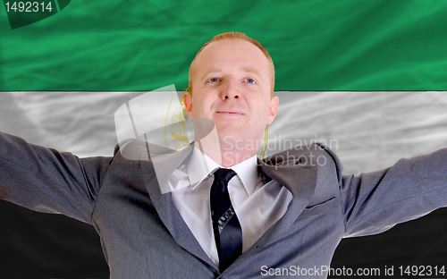 Image of happy businessman because of profitable investment in afghanista