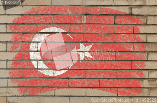 Image of flag of turkey on grunge brick wall painted with chalk  