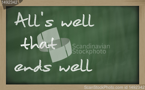 Image of " All's well that ends well " written on a blackboard