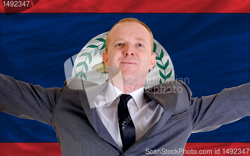 Image of happy businessman because of profitable investment in belize sta